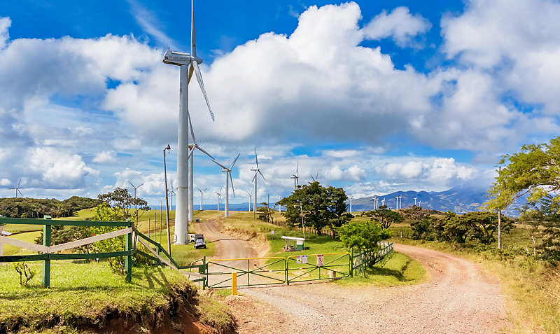 Wind turbines along a dusty road near Tierras Morenas, Guanacaste.