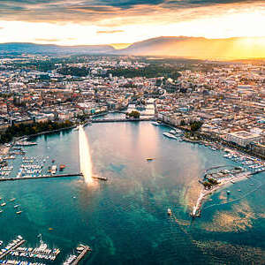 high angle view of Geneva city panoramic from drone point at sunset with famous travel destination jet d